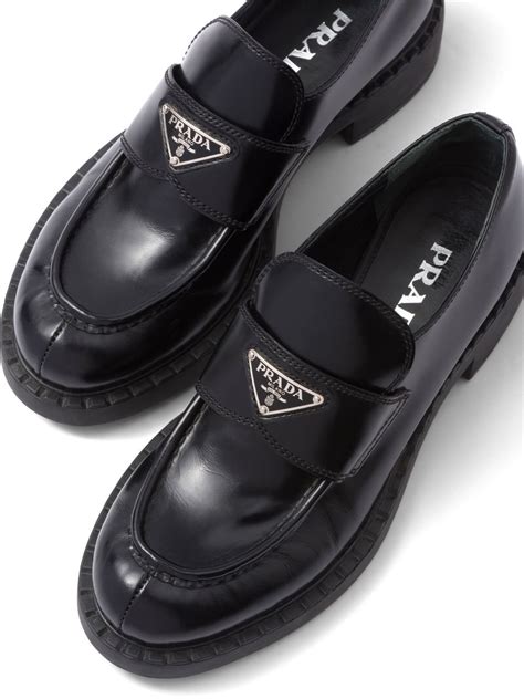 prada triangle logo loafer.